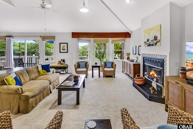 1127 Brumsey Ct Lot 324, Corolla, NC 27927 - carpeted living room with lofted ceiling, a tiled fireplace, and a ceiling fan