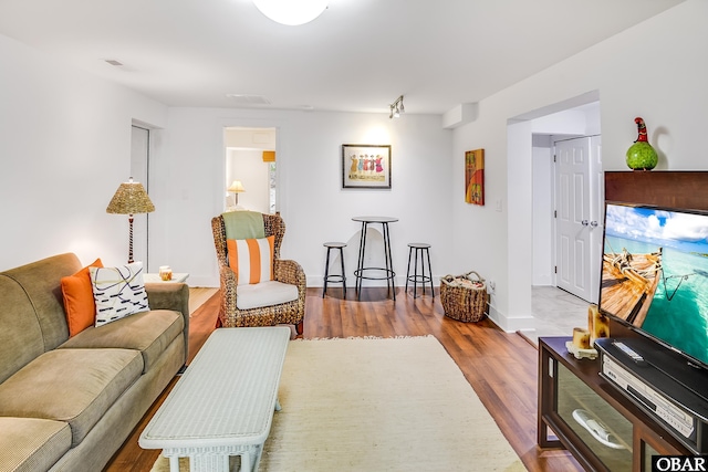 1127 Brumsey Ct Lot 324, Corolla, NC 27927 - living area featuring wood finished floors and baseboards