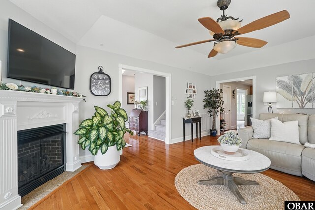 109 Cooper Landing Dr Lot 7, Aydlett, NC 27916 - living area with baseboards, stairs, a fireplace, and light wood-style floors