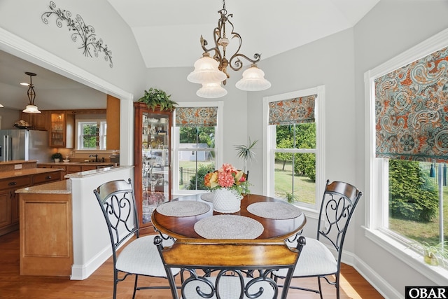109 Cooper Landing Dr Lot 7, Aydlett, NC 27916 - dining area with lofted ceiling, wood finished floors, and a chandelier