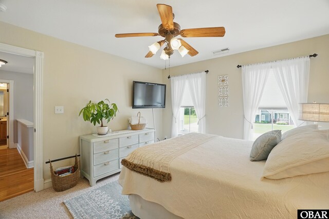 109 Cooper Landing Dr Lot 7, Aydlett, NC 27916 - bedroom with baseboards, a ceiling fan, and light colored carpet