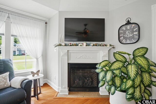 109 Cooper Landing Dr Lot 7, Aydlett, NC 27916 - living area featuring light wood-type flooring, a fireplace with flush hearth, ceiling fan, and baseboards