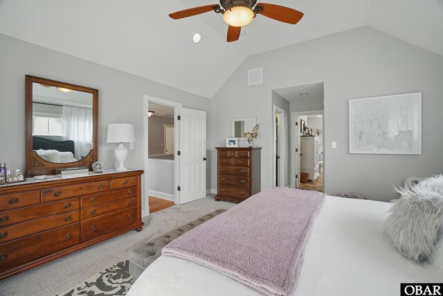 109 Cooper Landing Dr Lot 7, Aydlett, NC 27916 - bedroom with vaulted ceiling, ensuite bath, light colored carpet, ceiling fan, and baseboards