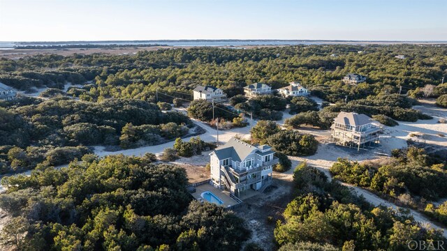 drone / aerial view with a view of trees