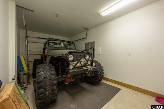 garage with baseboards