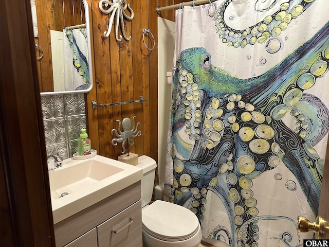 1232 S Virginia Dare Trl Lot 6, Kill Devil Hills, NC 27948 - bathroom featuring vanity, toilet, and curtained shower