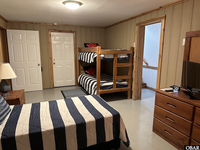 1232 S Virginia Dare Trl Lot 6, Kill Devil Hills, NC 27948 - bedroom with crown molding and wood walls