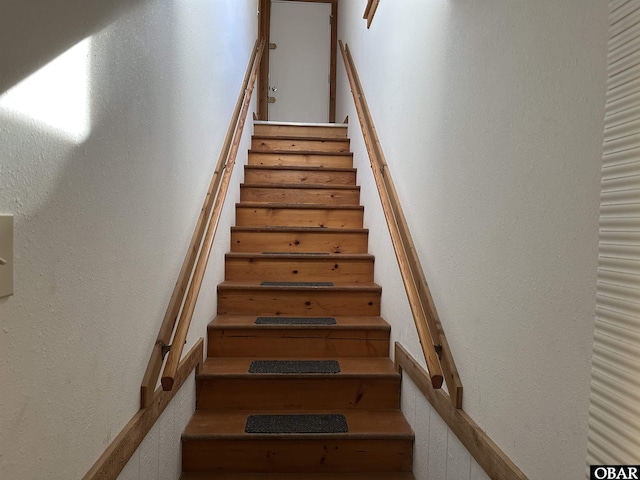 1232 S Virginia Dare Trl Lot 6, Kill Devil Hills, NC 27948 - staircase featuring a textured wall