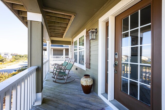 balcony featuring a sunroom