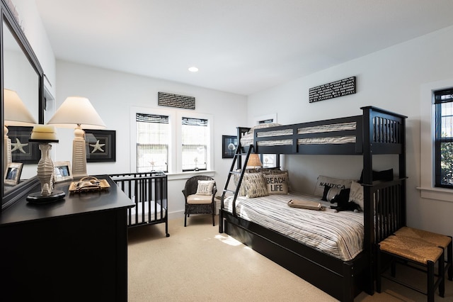 carpeted bedroom featuring recessed lighting