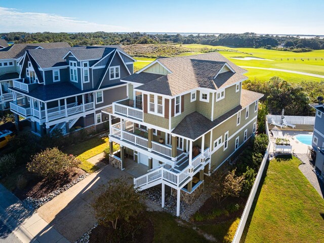 birds eye view of property with a residential view