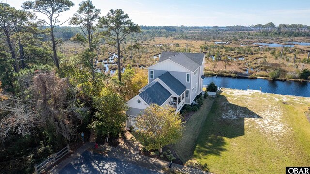 drone / aerial view with a water view