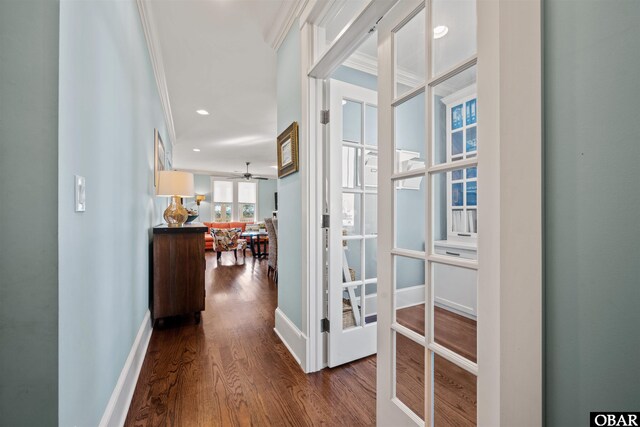 hallway with recessed lighting, baseboards, dark wood-style flooring, and crown molding