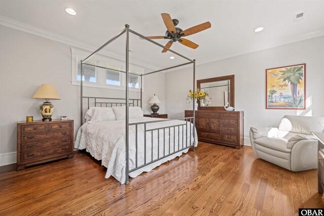 bedroom featuring crown molding, recessed lighting, and wood finished floors