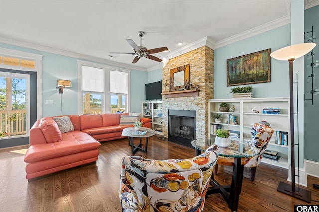 living room featuring a healthy amount of sunlight and ornamental molding