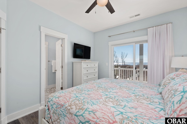 bedroom with visible vents, dark wood-type flooring, ceiling fan, access to outside, and baseboards