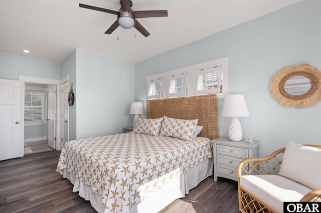 bedroom with dark wood finished floors, a ceiling fan, and recessed lighting