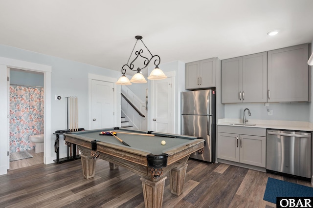 recreation room featuring billiards, baseboards, dark wood finished floors, and a sink