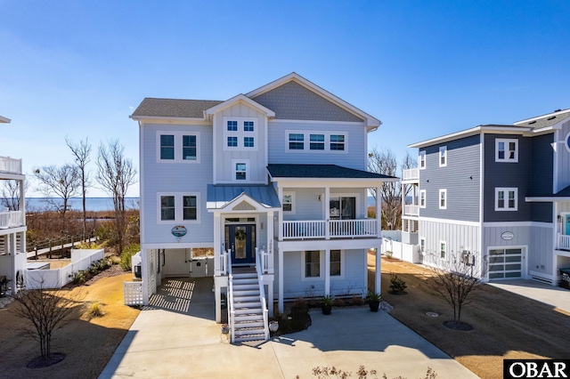 view of front of house featuring concrete driveway and board and batten siding