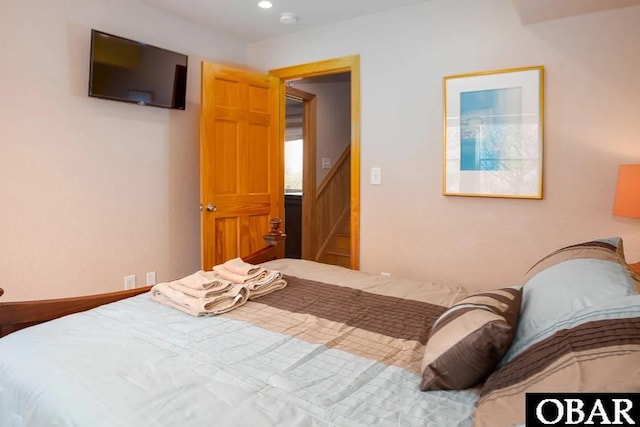 bedroom featuring recessed lighting