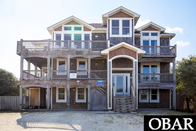 view of front of house with a balcony