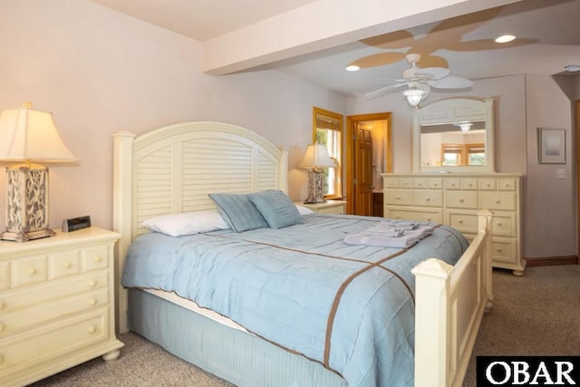 bedroom with recessed lighting, beam ceiling, and light colored carpet