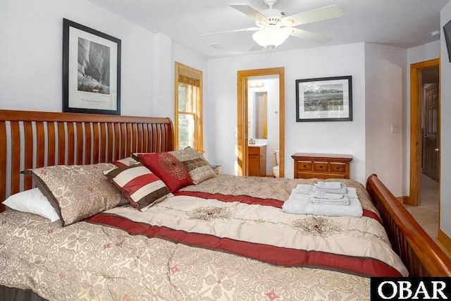 bedroom with connected bathroom and ceiling fan