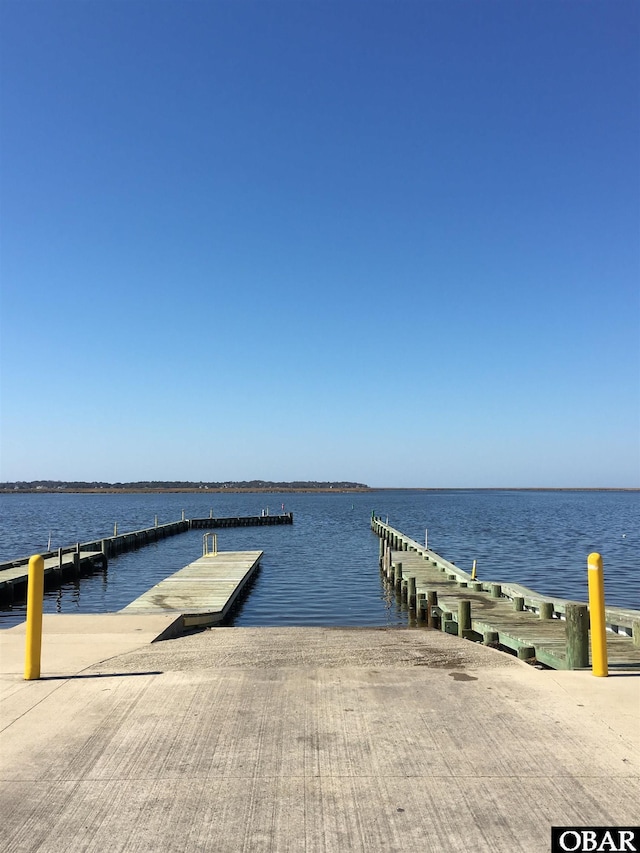 615 W Aycock St Unit 5-7, Kill Devil Hills, NC 27948 - dock area with a boat ramp and a water view