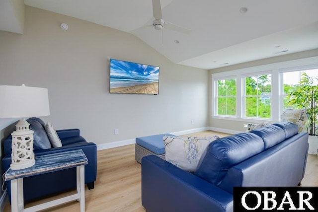 105D Colington Pointe Cir Unit 104-D, Kill Devil Hills, NC 27948 - living area with vaulted ceiling, ceiling fan, and light wood finished floors