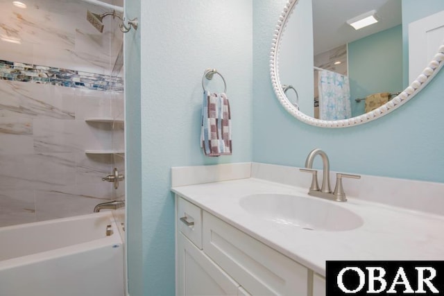 105D Colington Pointe Cir Unit 104-D, Kill Devil Hills, NC 27948 - bathroom featuring vanity and shower / bath combo with shower curtain