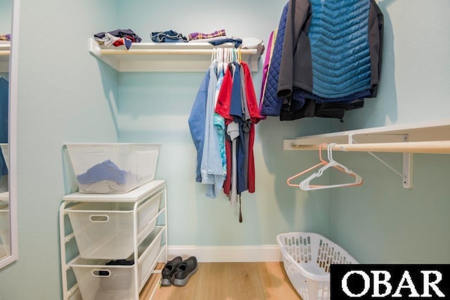 105D Colington Pointe Cir Unit 104-D, Kill Devil Hills, NC 27948 - spacious closet featuring wood finished floors