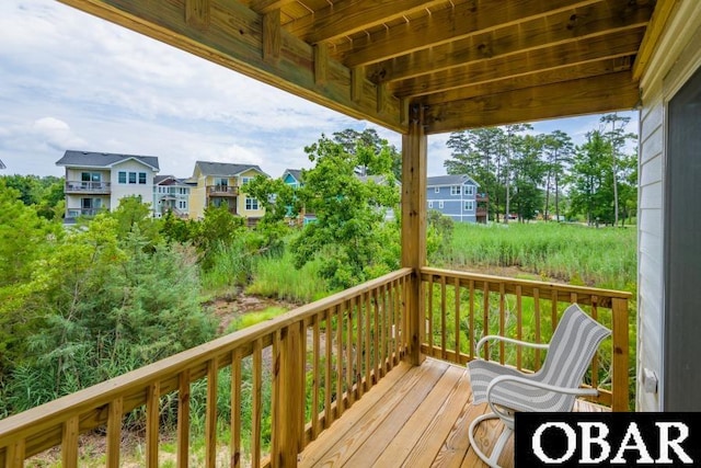 105D Colington Pointe Cir Unit 104-D, Kill Devil Hills, NC 27948 - wooden deck featuring a residential view