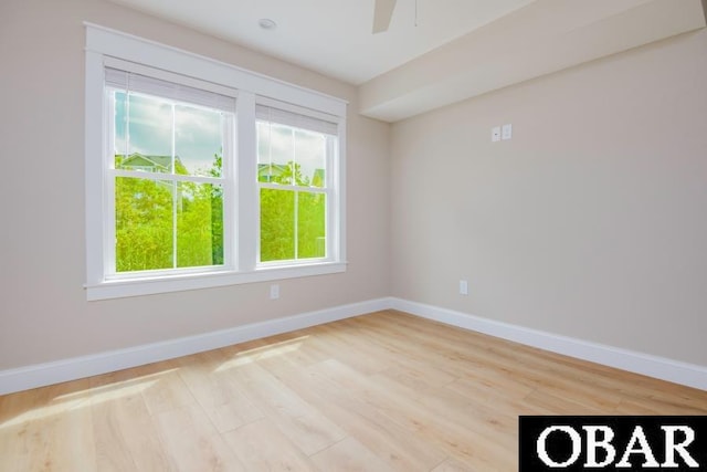 105D Colington Pointe Cir Unit 104-D, Kill Devil Hills, NC 27948 - empty room with wood finished floors and ceiling fan