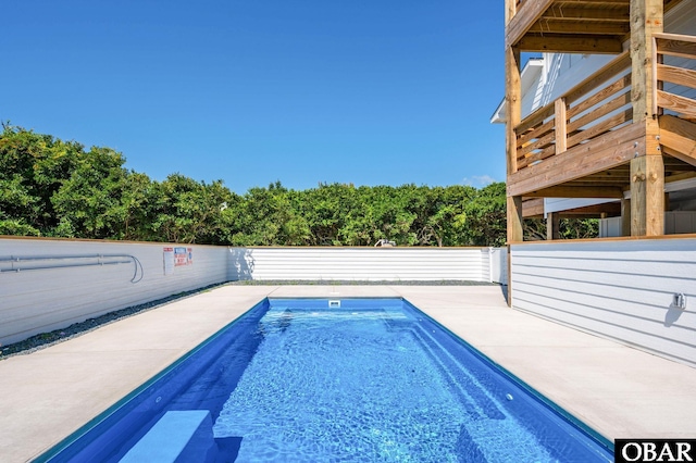 2002 Sandpiper Rd Lot 12, Corolla, NC 27927 - view of swimming pool with a fenced backyard