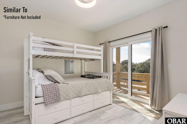 bedroom with light wood finished floors, access to outside, and baseboards