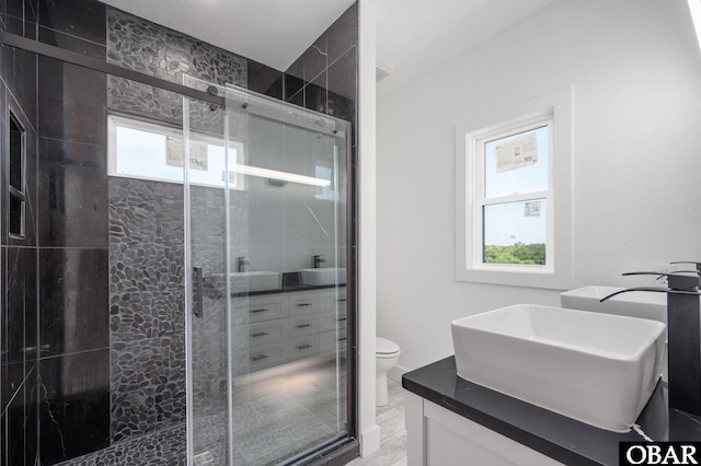 2002 Sandpiper Rd Lot 12, Corolla, NC 27927 - bathroom with double vanity and a stall shower