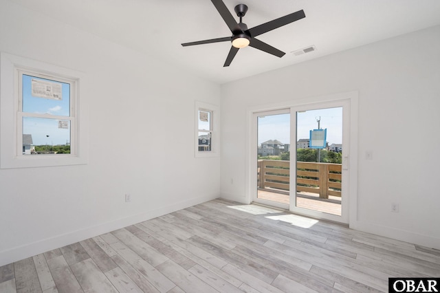 2002 Sandpiper Rd Lot 12, Corolla, NC 27927 - spare room featuring a ceiling fan and light wood-type flooring