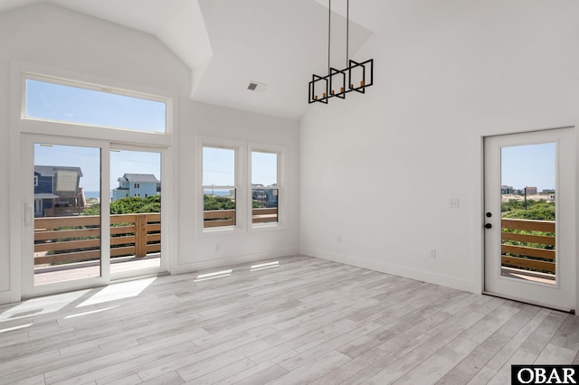2002 Sandpiper Rd Lot 12, Corolla, NC 27927 - unfurnished sunroom featuring lofted ceiling and plenty of natural light