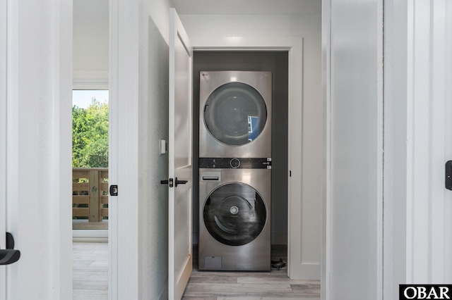 2002 Sandpiper Rd Lot 12, Corolla, NC 27927 - laundry area with estacked washer and dryer and wood finished floors