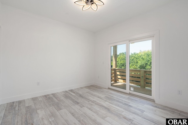 2002 Sandpiper Rd Lot 12, Corolla, NC 27927 - unfurnished room with wood finished floors and baseboards