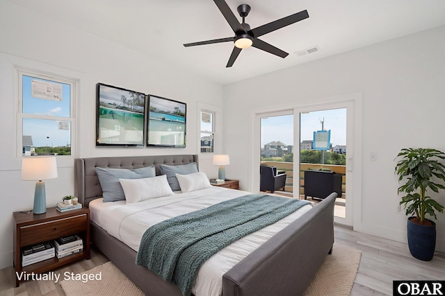 2002 Sandpiper Rd Lot 12, Corolla, NC 27927 - bedroom with access to outside, light wood finished floors, and ceiling fan