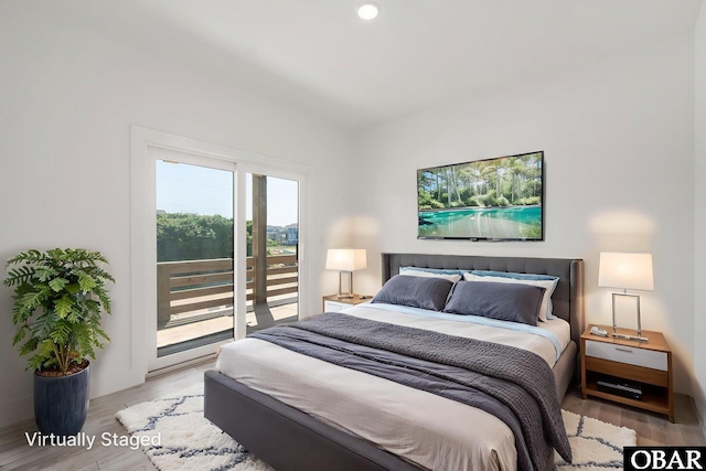 2002 Sandpiper Rd Lot 12, Corolla, NC 27927 - bedroom with wood finished floors, access to exterior, and recessed lighting
