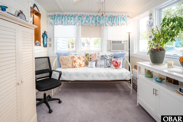 interior space with cooling unit and dark colored carpet
