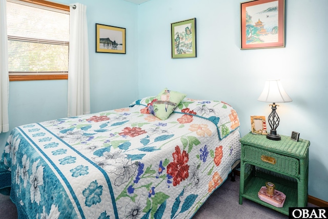 bedroom featuring carpet