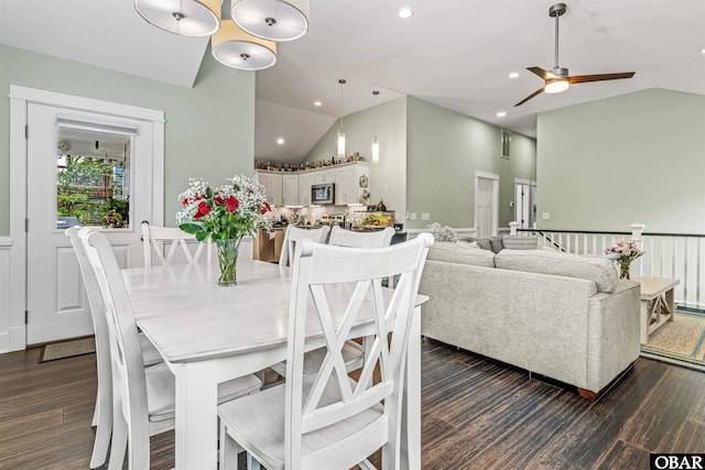 dining area featuring lofted ceiling, ceiling fan, dark wood-style flooring, and recessed lighting