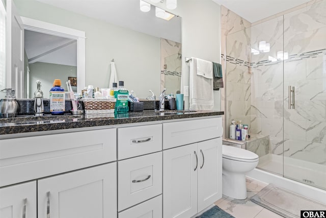 bathroom with toilet, marble finish floor, a marble finish shower, and vanity