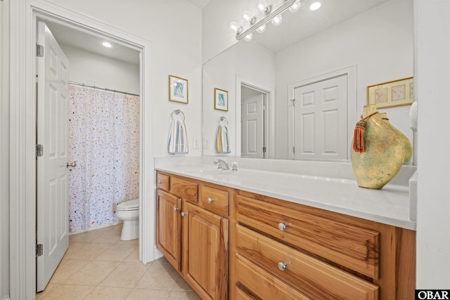 403 Sailfish Dr Unit 403, Manteo, NC 27954 - bathroom featuring toilet, vanity, tile patterned floors, and a shower with curtain