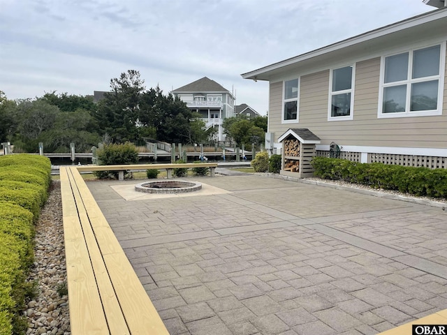 403 Sailfish Dr Unit 403, Manteo, NC 27954 - view of patio with a fire pit