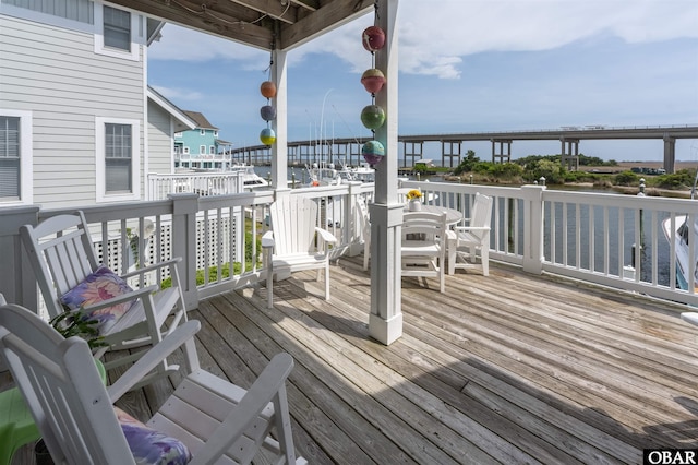 403 Sailfish Dr Unit 403, Manteo, NC 27954 - wooden terrace with a water view