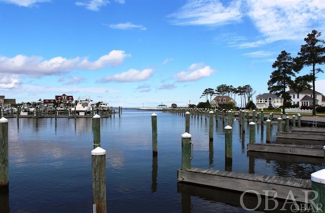 view of dock with a water view